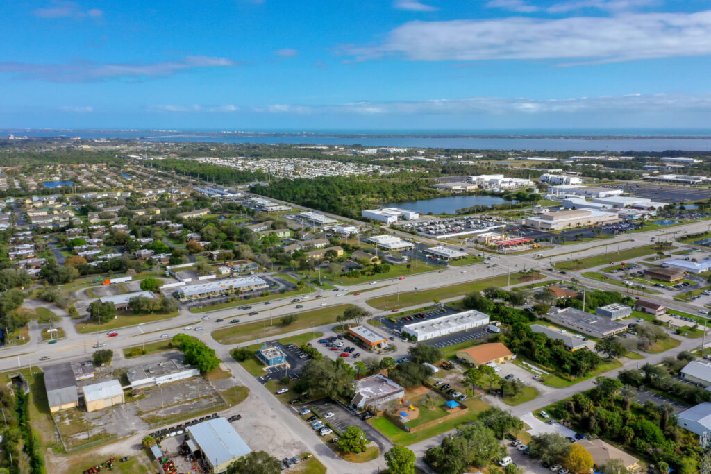 Aerial view of Brevard County Florida showing residential neighborhoods and commercial buildings served by Clean n Dry’s professional cleaning services
